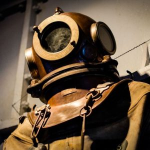 A Historical Diving suit with metal headpiece